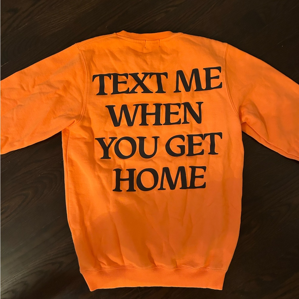 Orange lonely ghost sweatshirt size M.